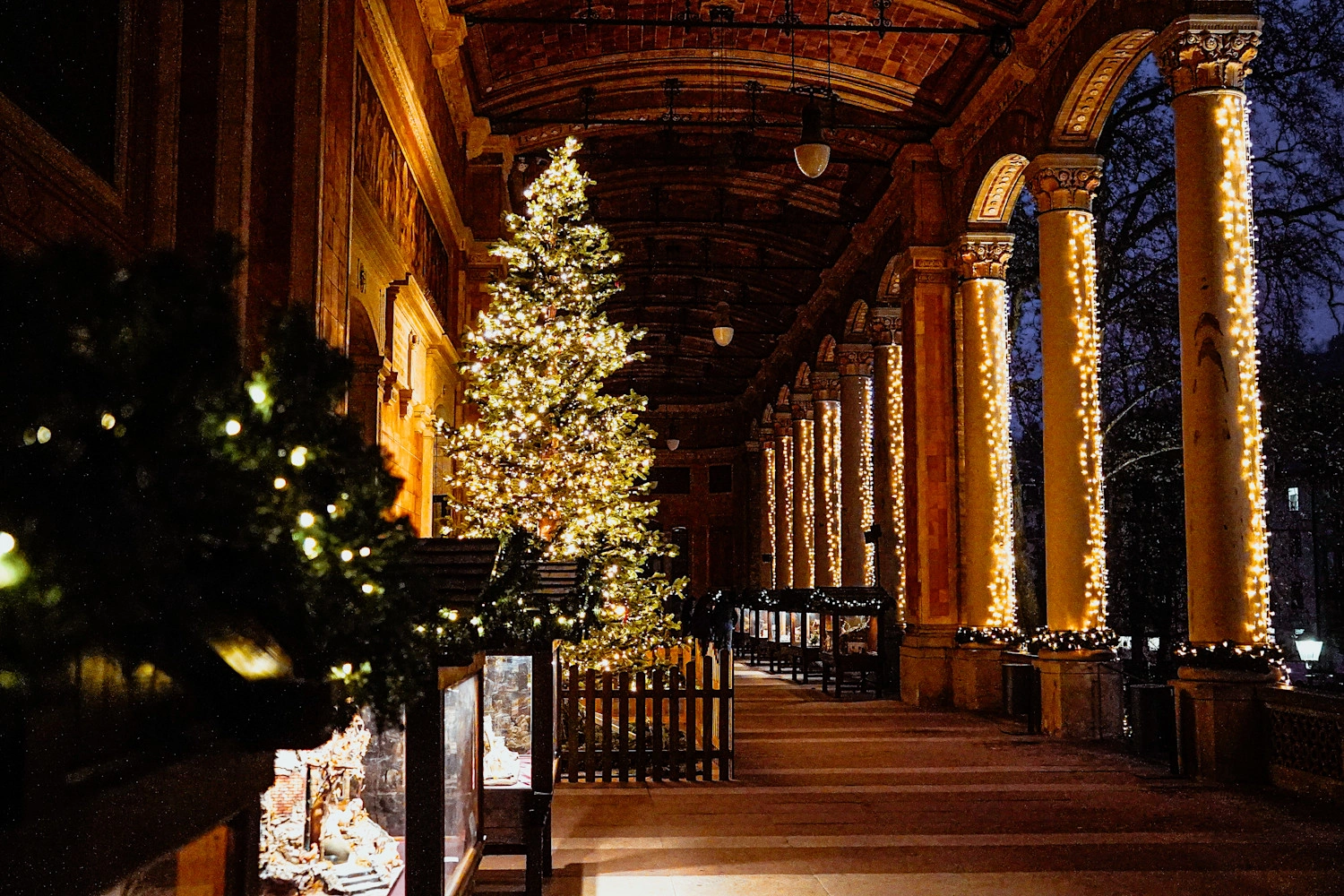 A magnificent corridor lit up in Christmas splendor.