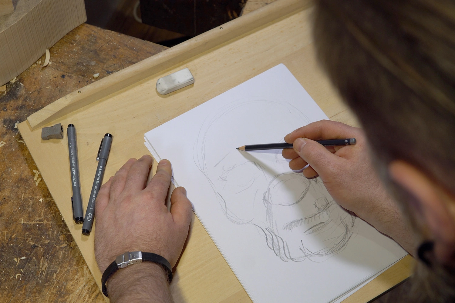 A sketch of the mask for german carnival is pepared.