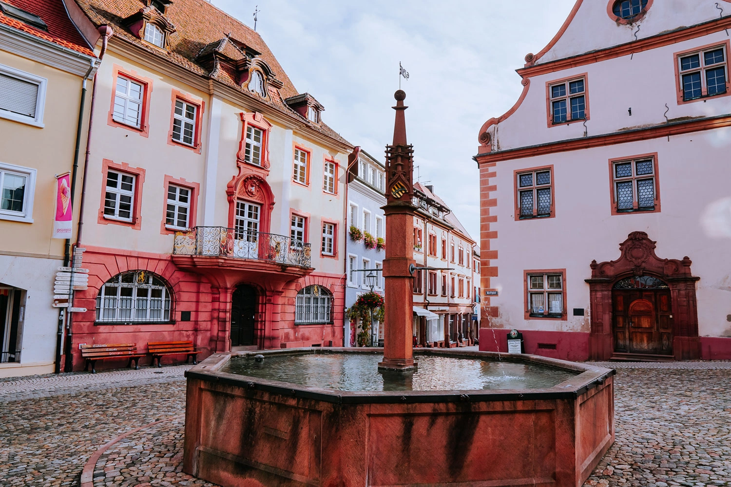 A Fountain on the market square in a town.
