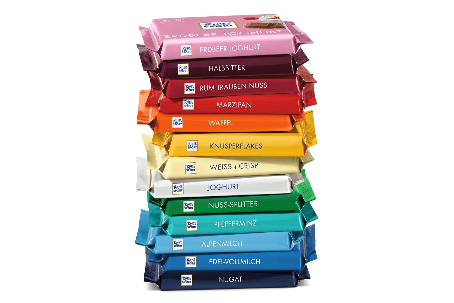 Colorful, square chocolate bars stacked on top of each other