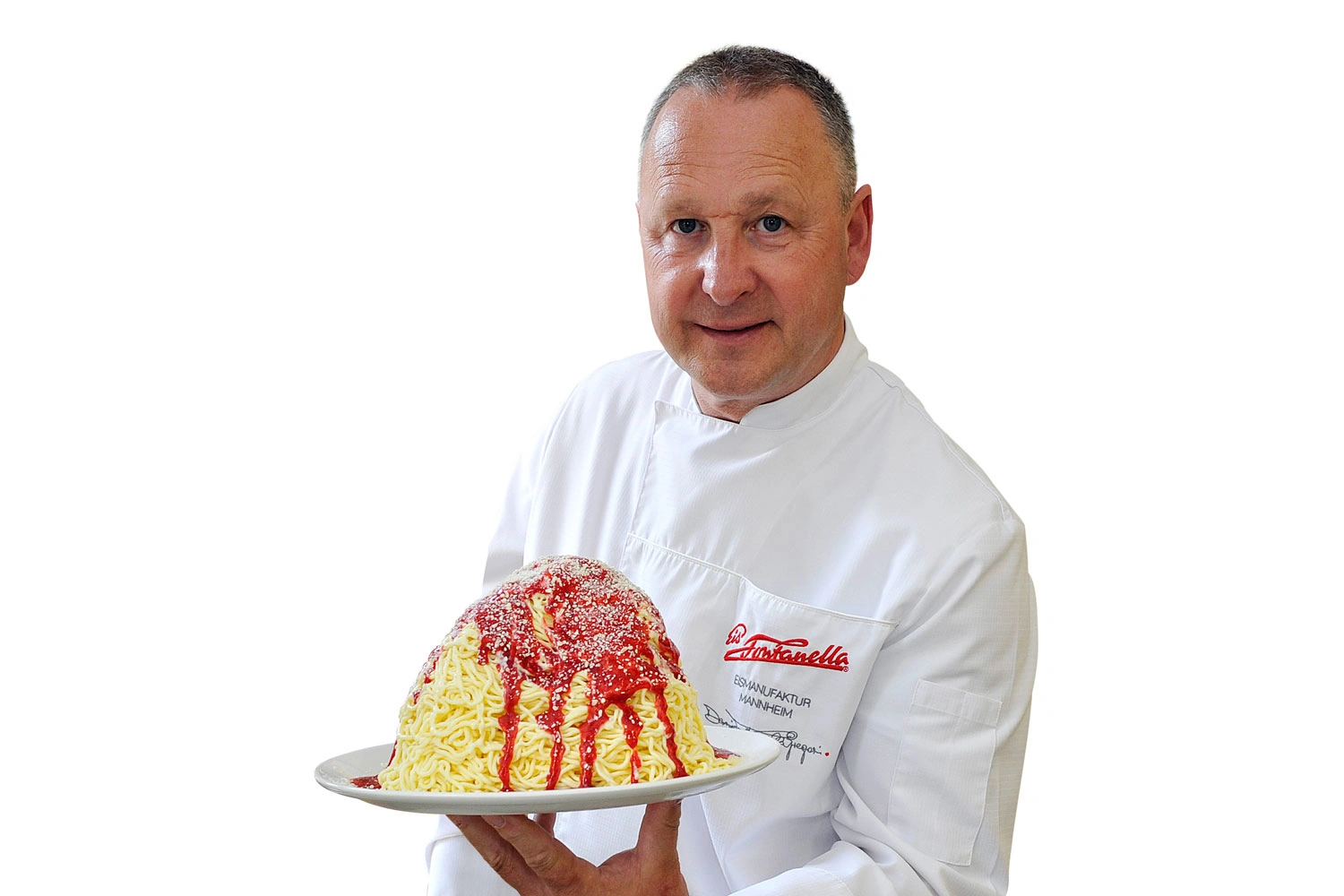 Ein Eismeister mit einem Teller Spaghetti-Eis