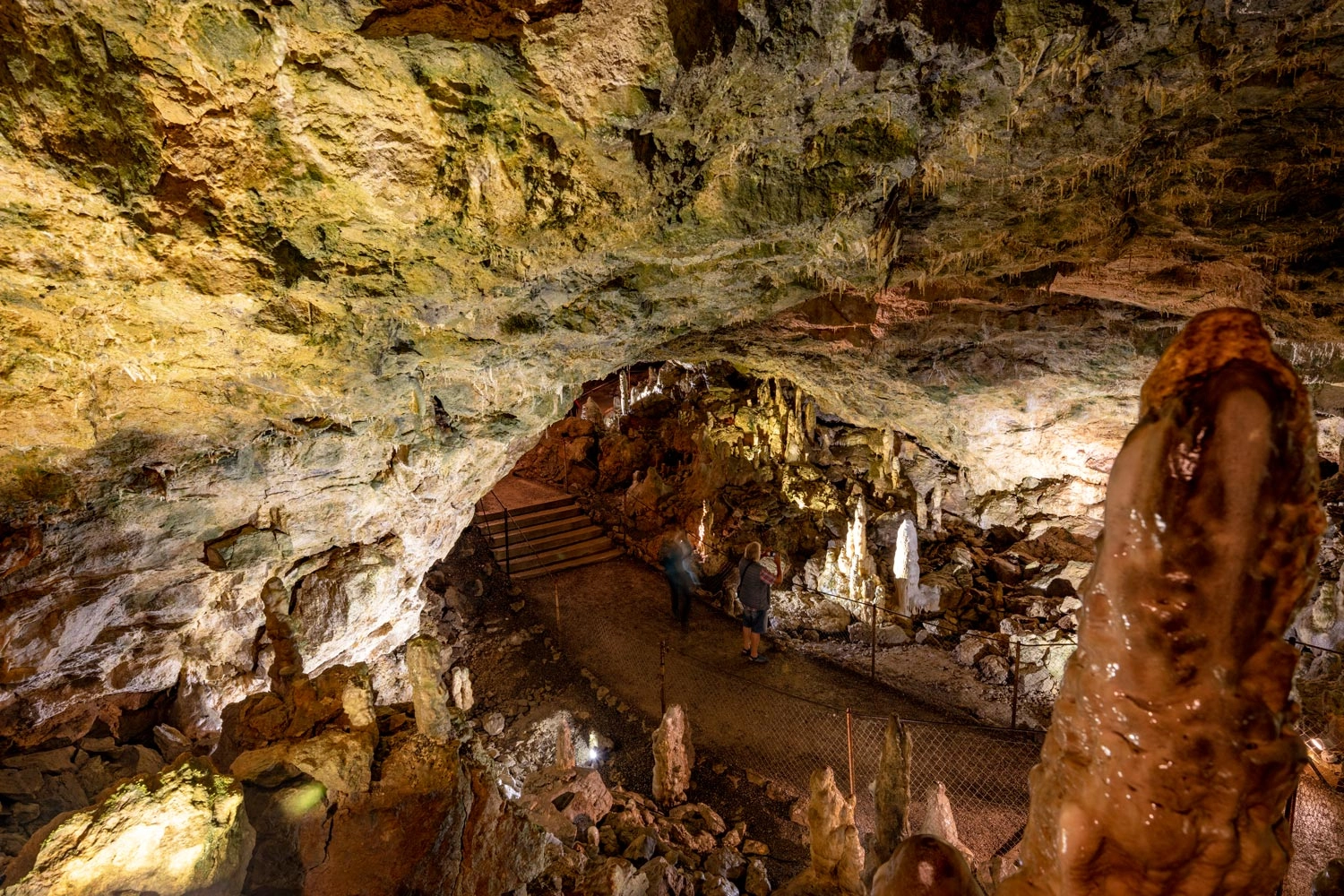 Hole in a large rock as an entrance to a cave.
