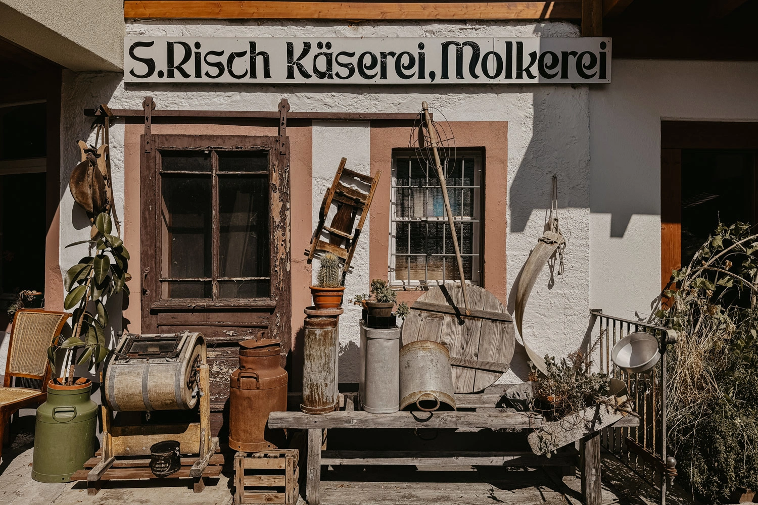 Historic cheese dairy with many utensils from the past