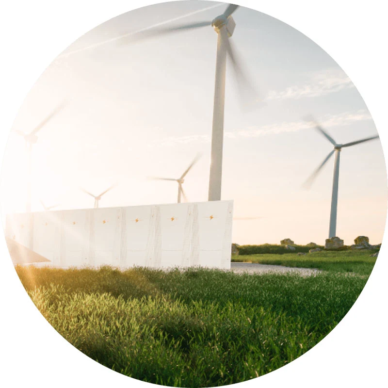 Windmills in a field of grass