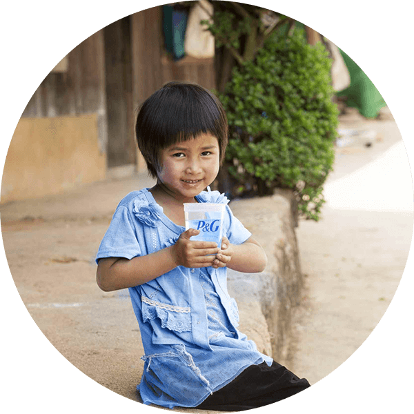 Children smiling and drinking water