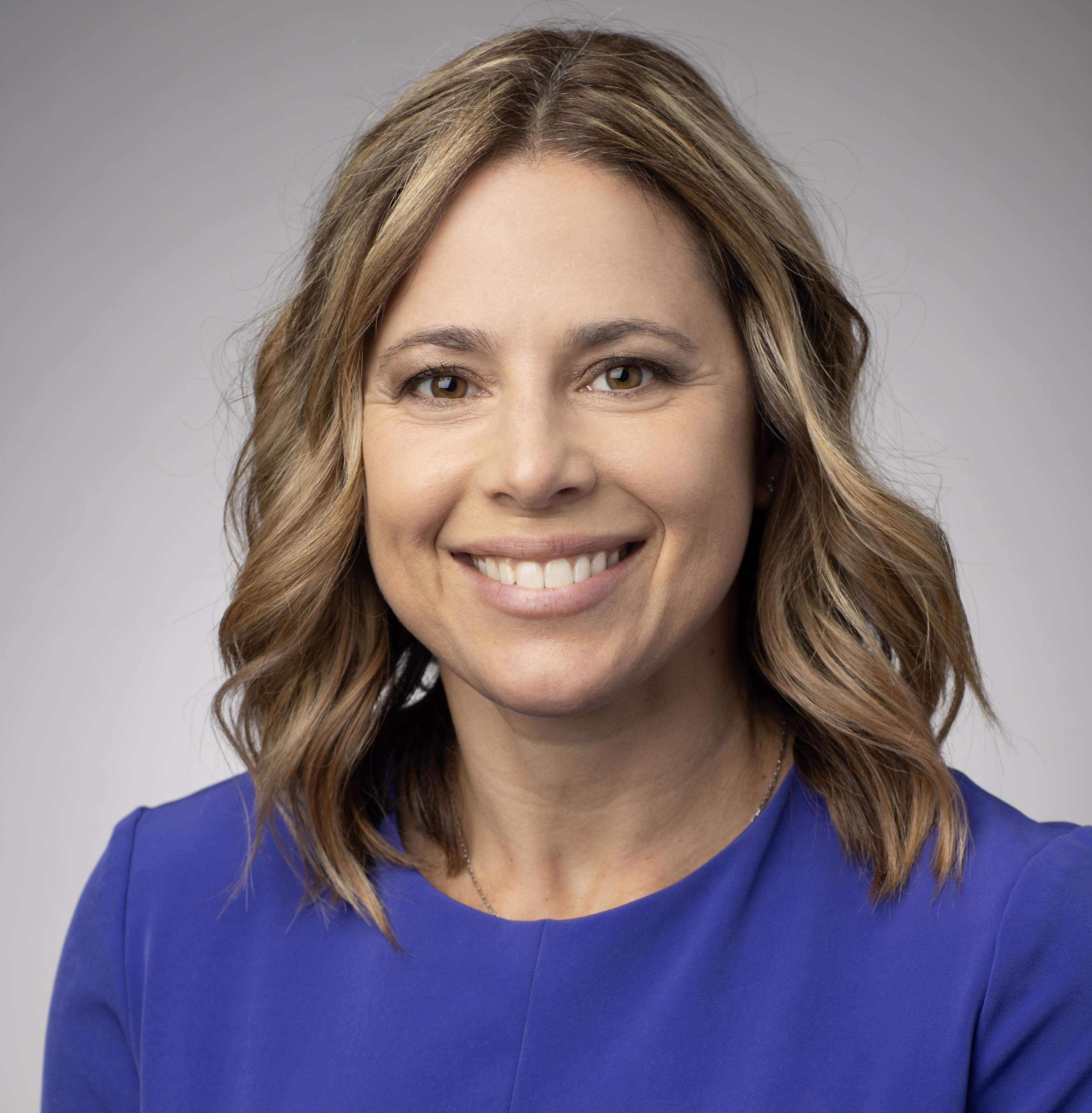 Head and shoulders photo of Sami Mansfield, a white woman.