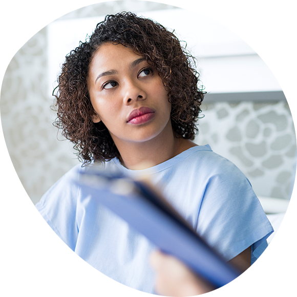female patient in surgical gown