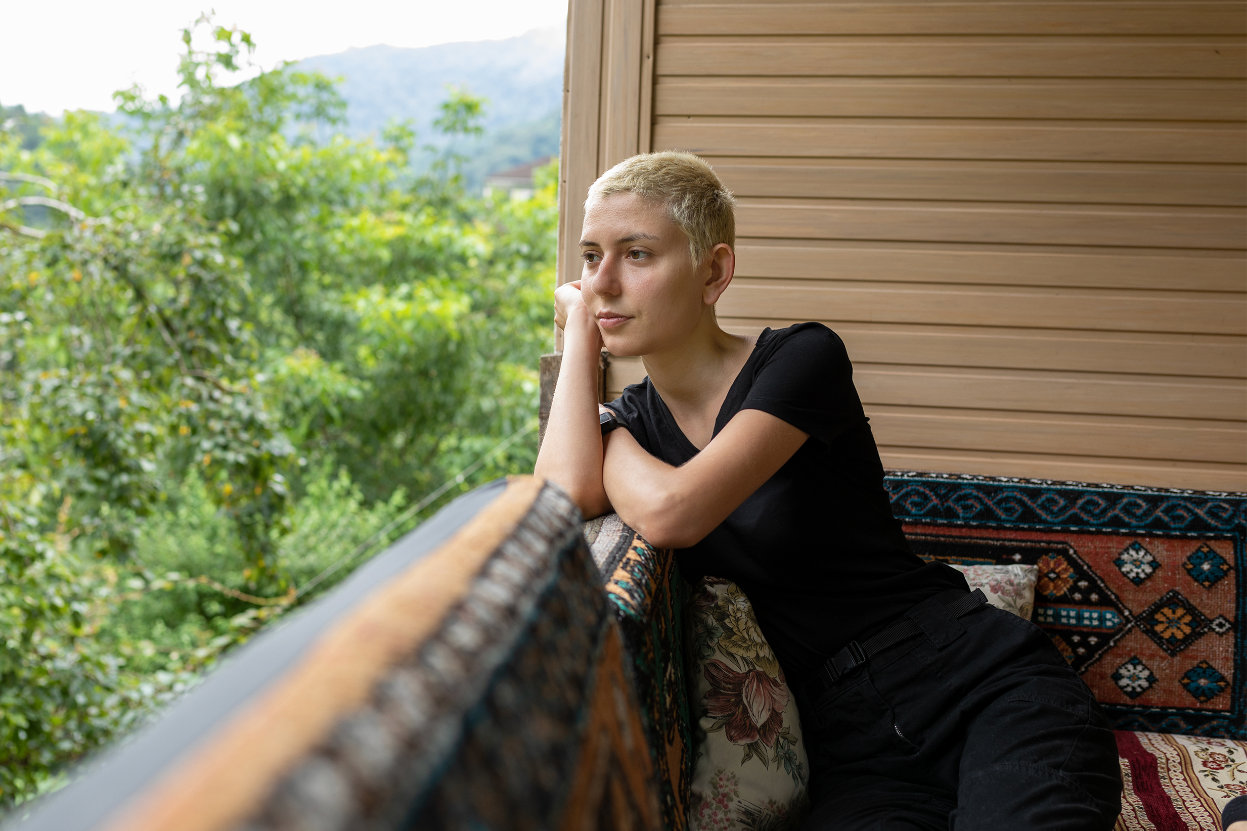 Woman Gazing on Porch 2466x1644