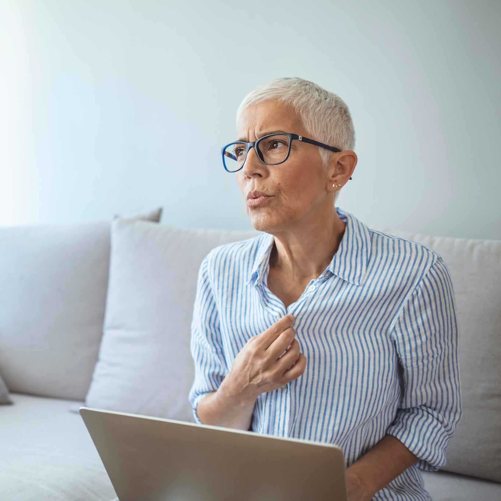 postmenopausal woman having a hot flash