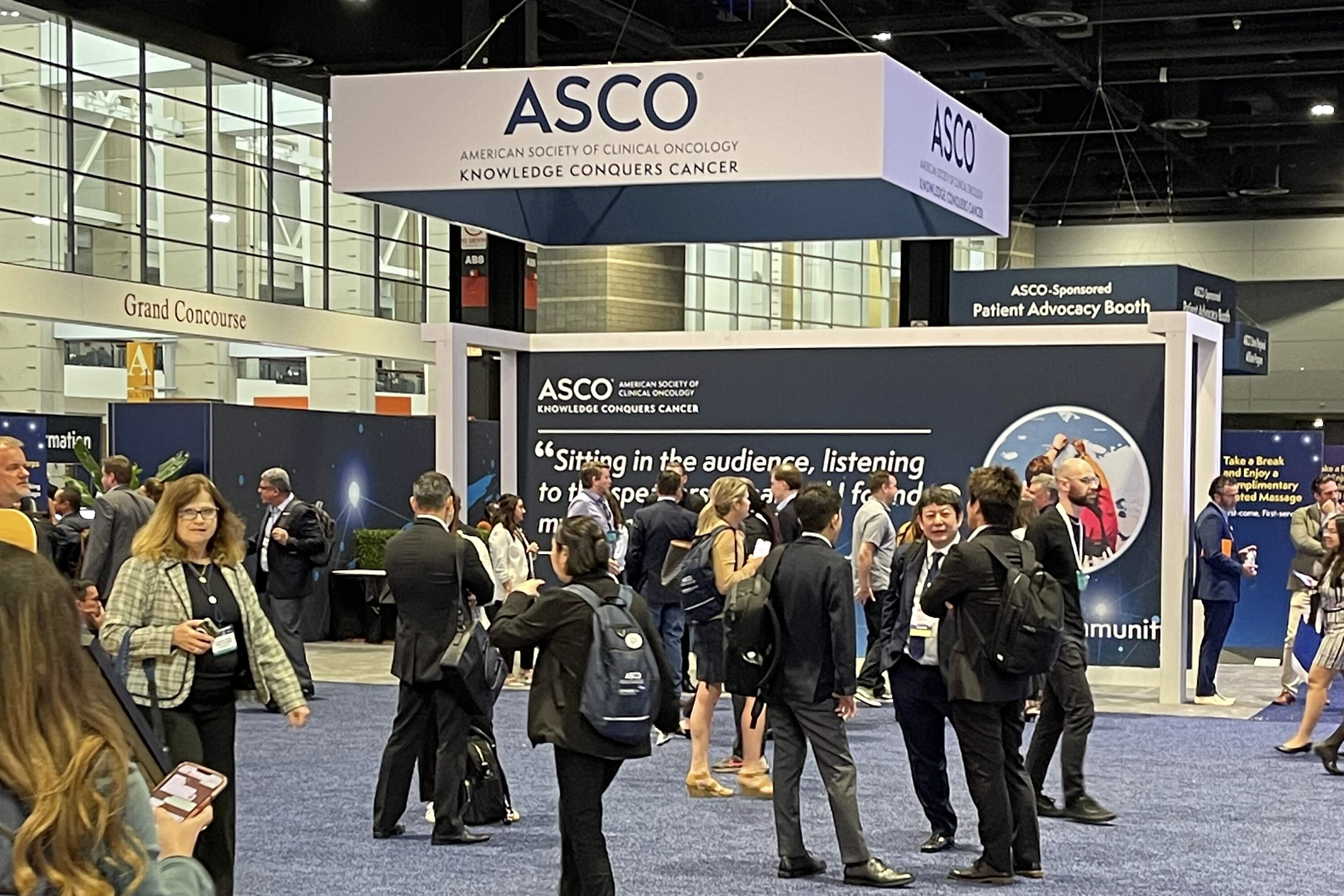 People walking around at the ASCO annual meeting.