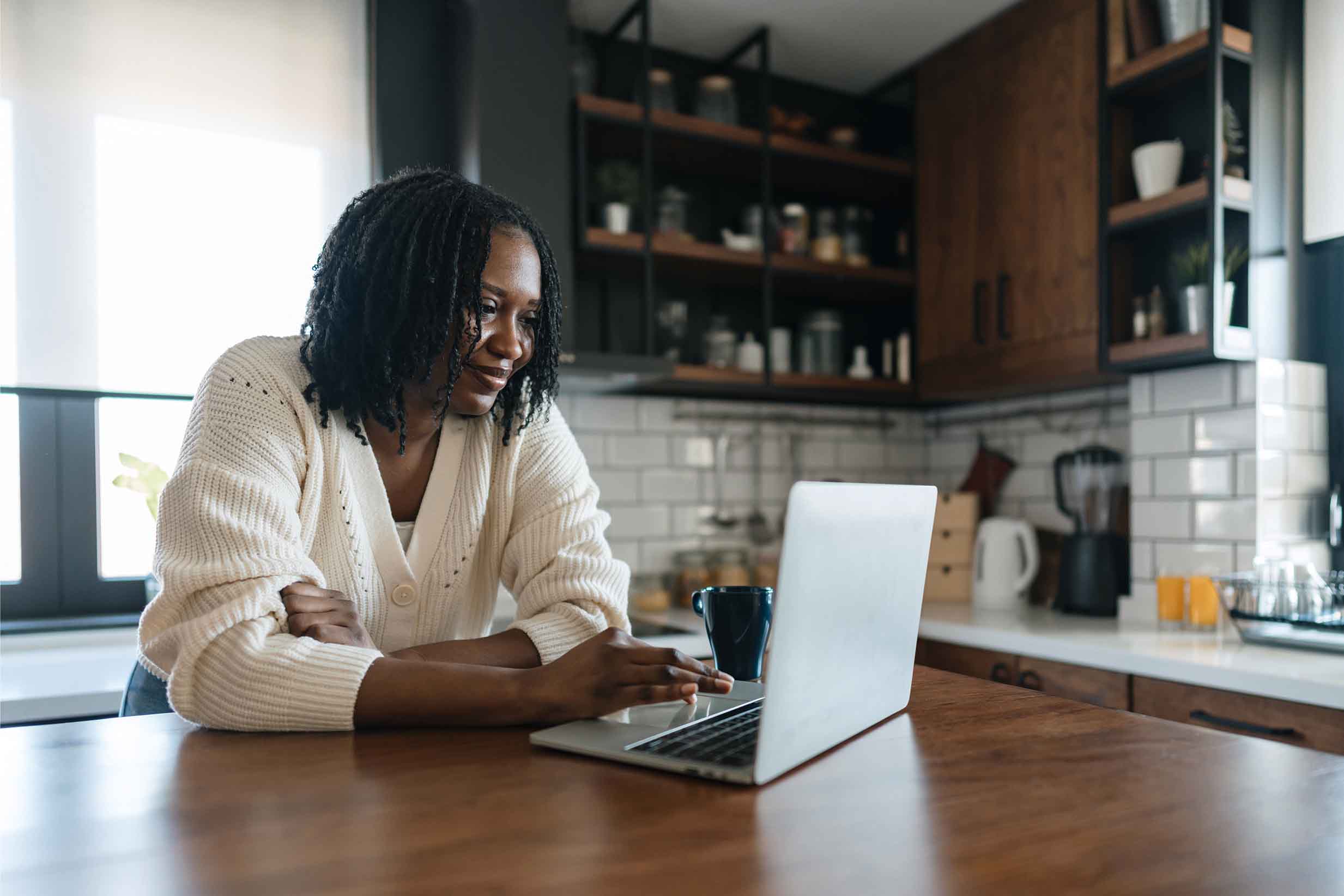 Woman on computer at hom e2466x1644