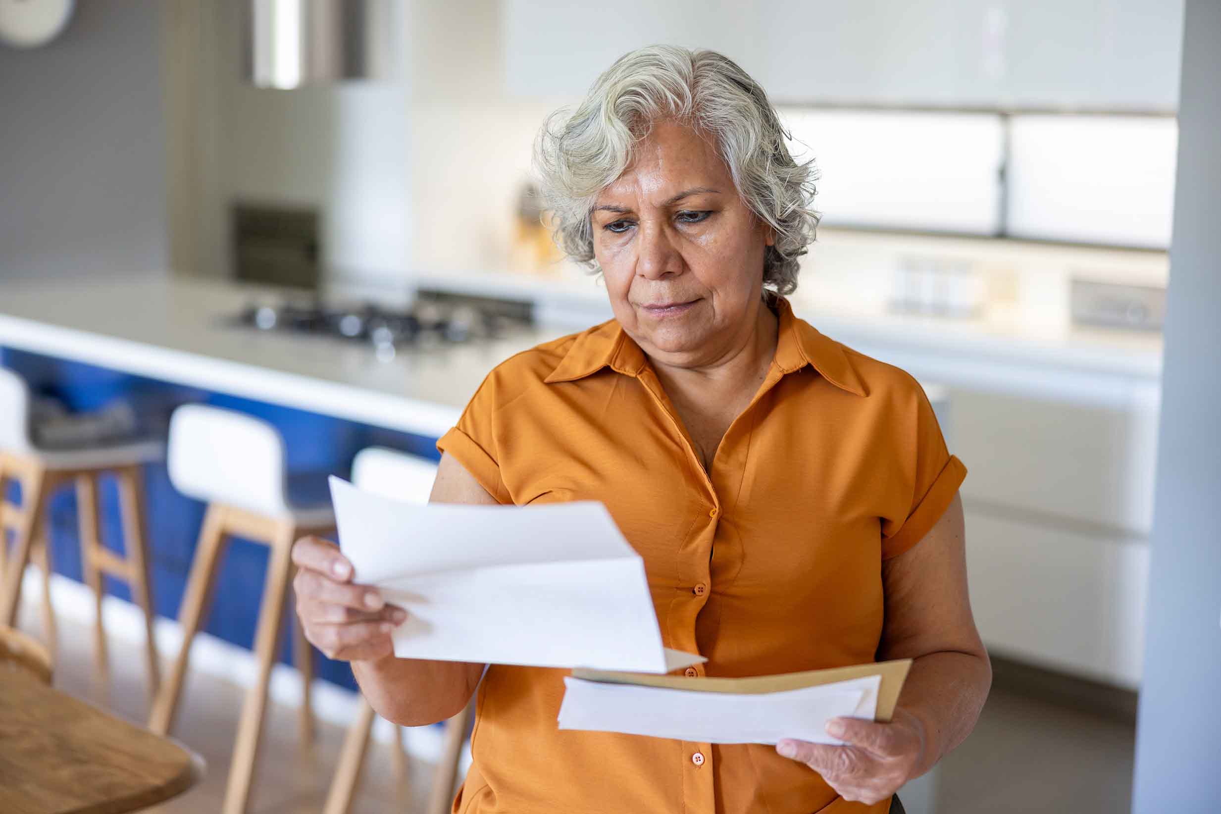 Woman with Medicare Advantage paperwork 