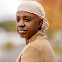 Chemo side effects woman in head scarf square